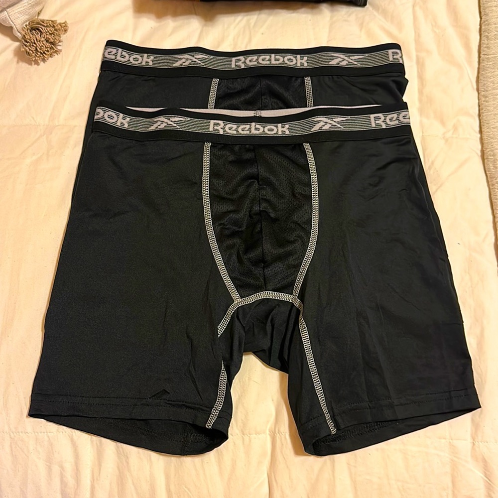 NWOT three pair of men’s size, small boxer, briefs, Reebok, and body glove